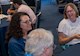 attendees at a table having a conversation