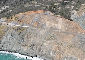 Aerial view of Highway 1 crossing a reconstructed landslide
