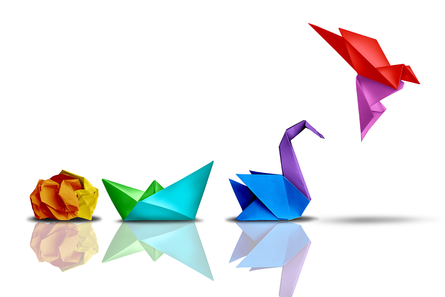 There are four images on the picture. The first shows a crumpled piece of pager. The second the crumpled paper transformed into another shape. The third shows a swan, and the fourth shows the bird taking flight. These images represent evolution, transformation, innovation, and creativity. 